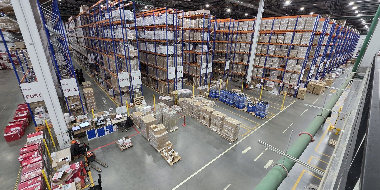 A BIOCARD Group warehouse floor seen from the mezzanine