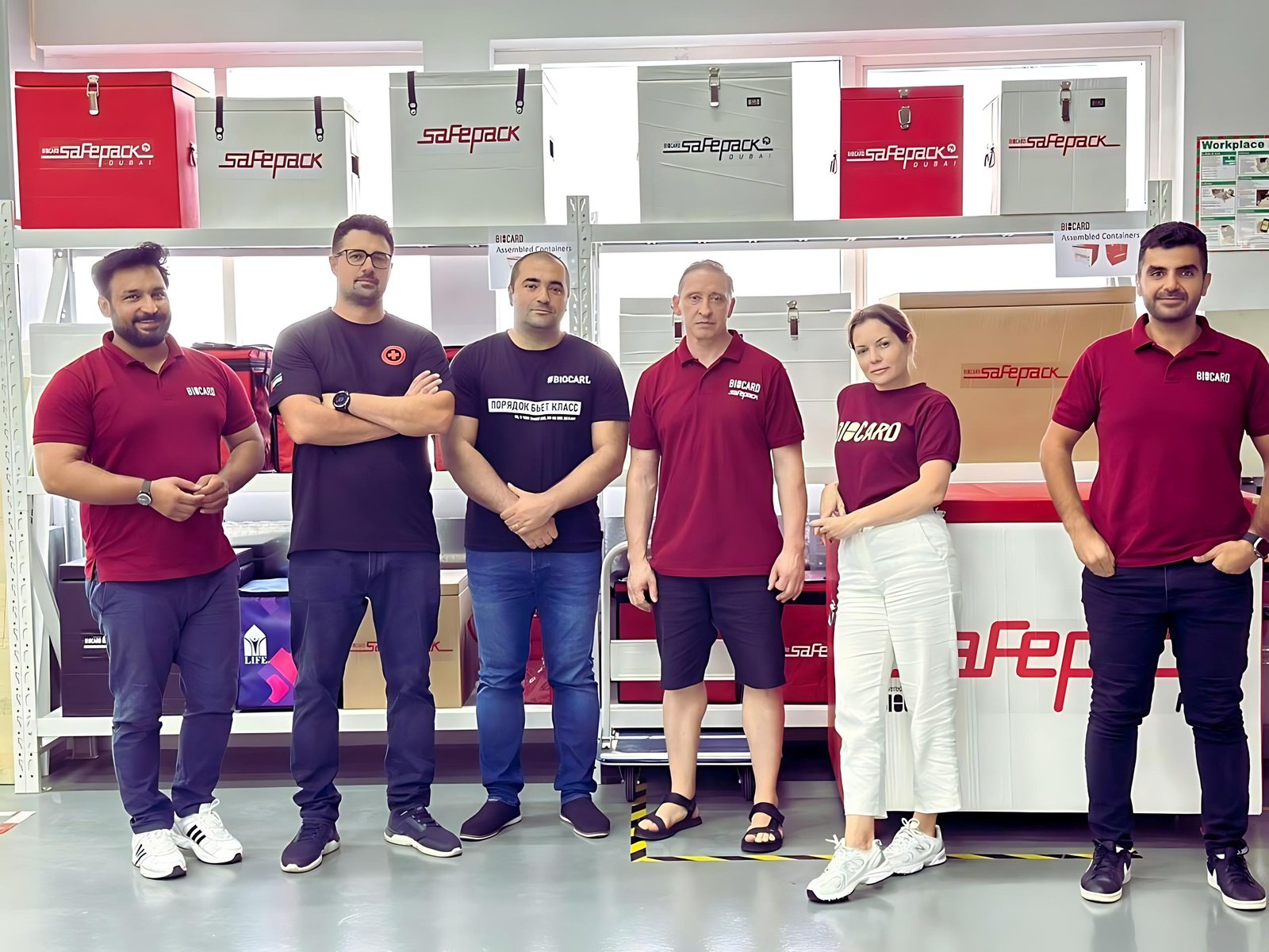 The BIOCARD Dubai team in front of SafePack containers at the Jebel Ali facility