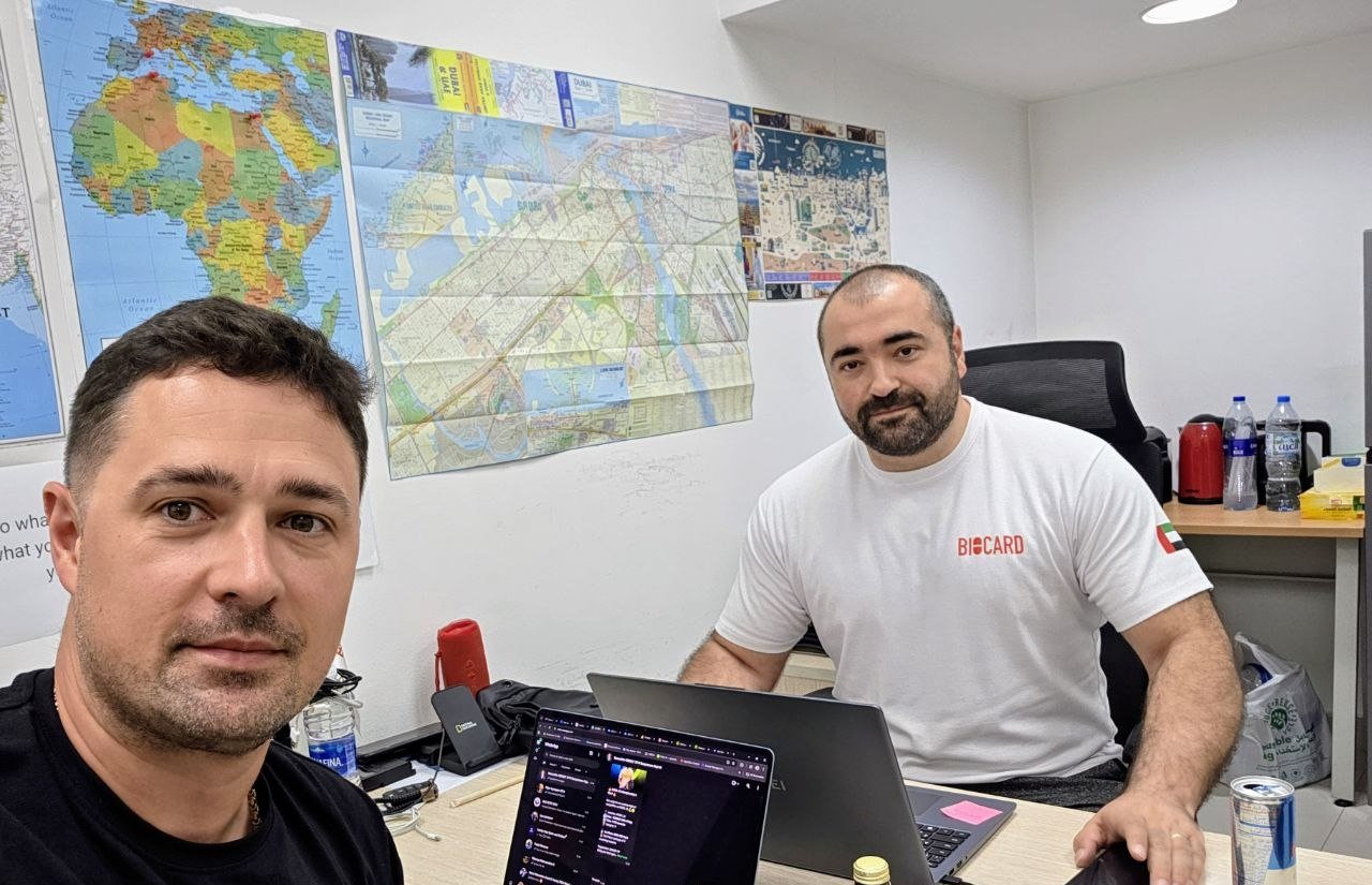 BIOCARD operations team planning routes with UAE and world maps